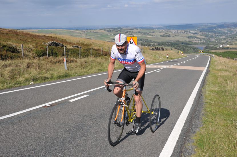 Image of Gary Wright on three wheels